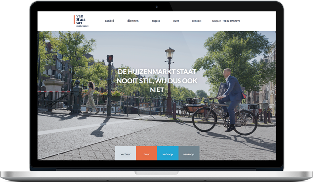 Volledig responsive website met actueel woningaanbod, hier op een MacBook